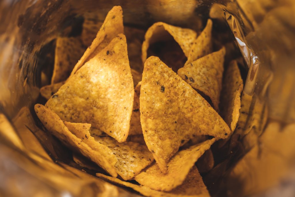 Can Dogs Eat Doritos? The Effects Of Human Food On Dogs