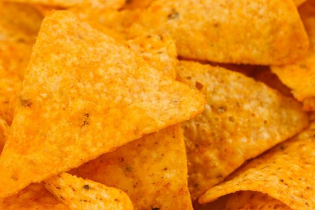 Can Dogs Eat Doritos? The Effects Of Human Food On Dogs