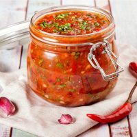 Tomato salsa in a glass jar