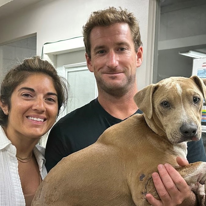 family with their burned dog