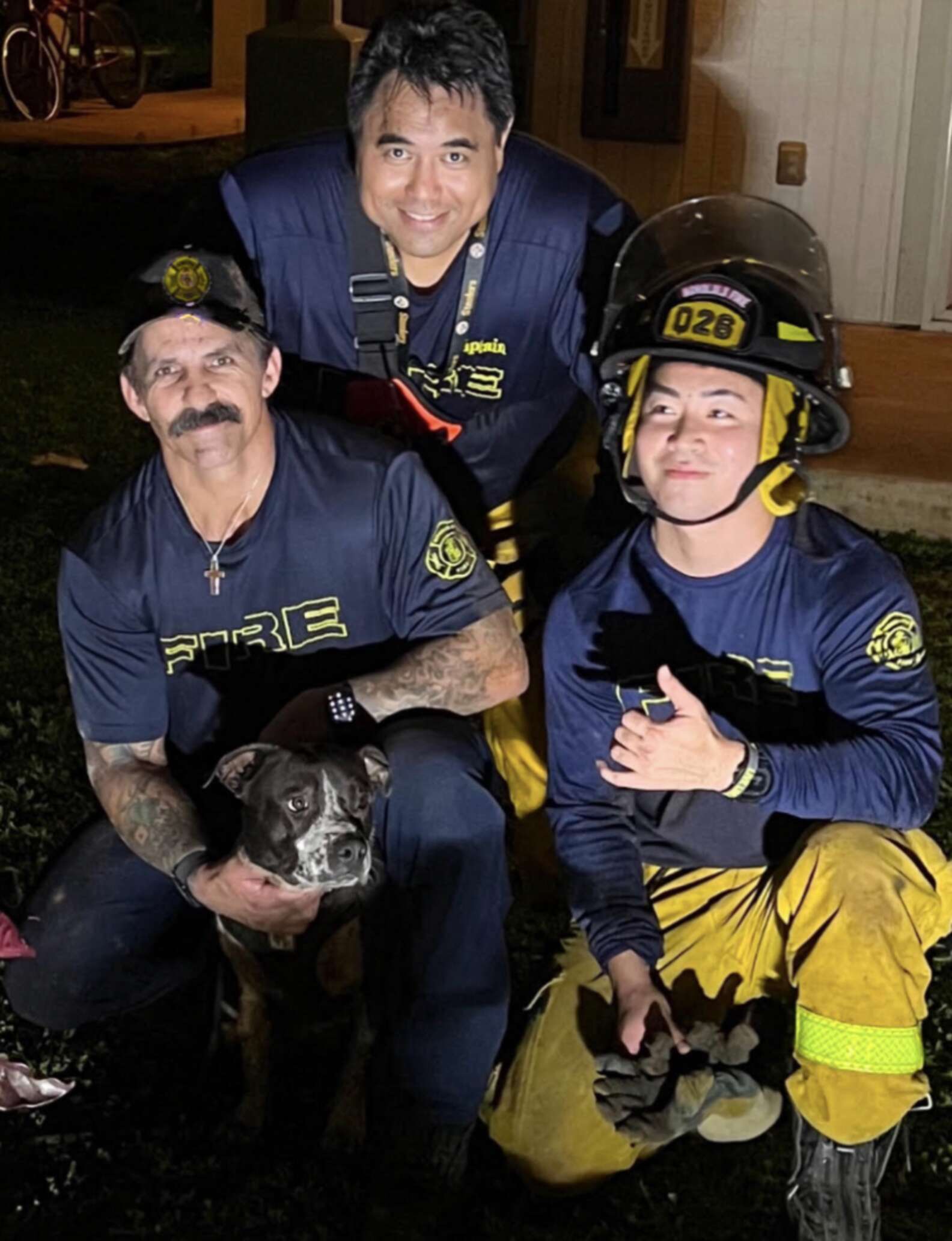 firefighters and dog