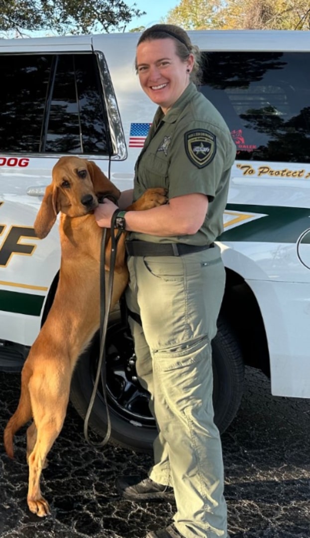 photo of officer and a dog