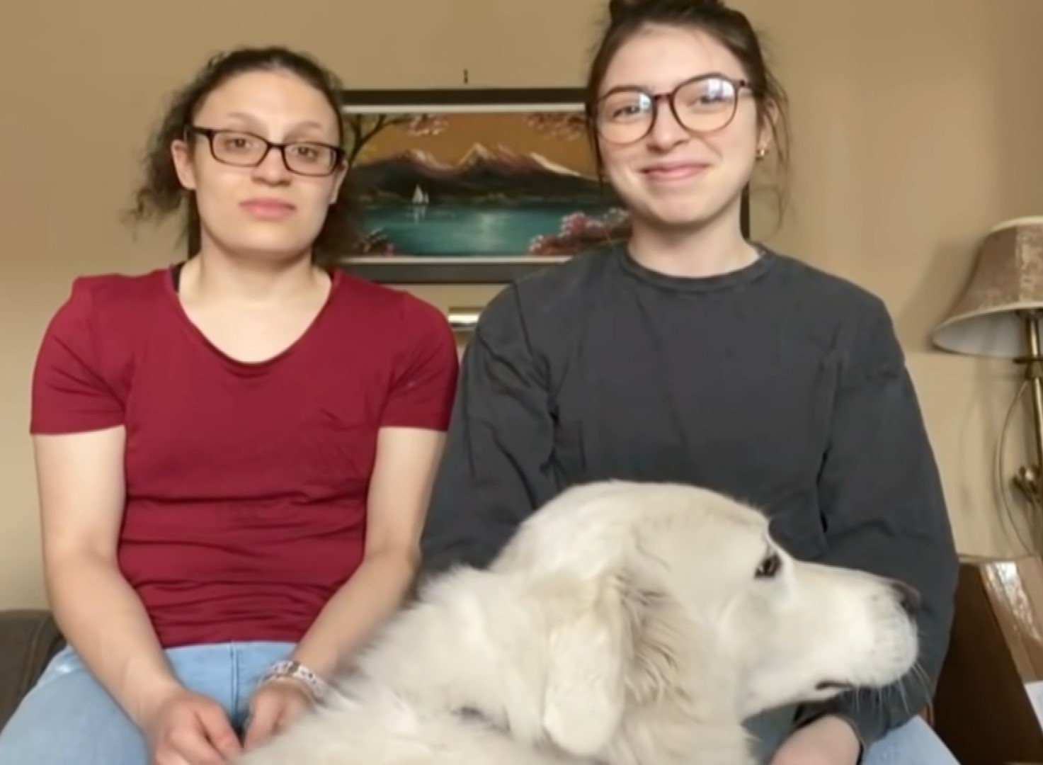 two women and a dog