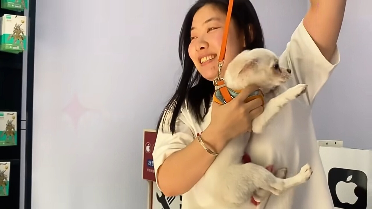 Asian girl and white puppy