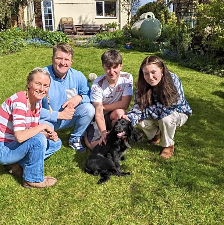 family and six legged dog