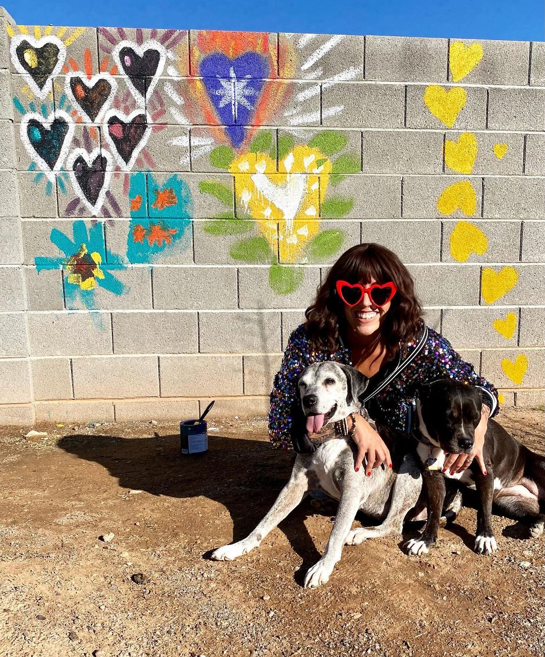 woman posing with her dog