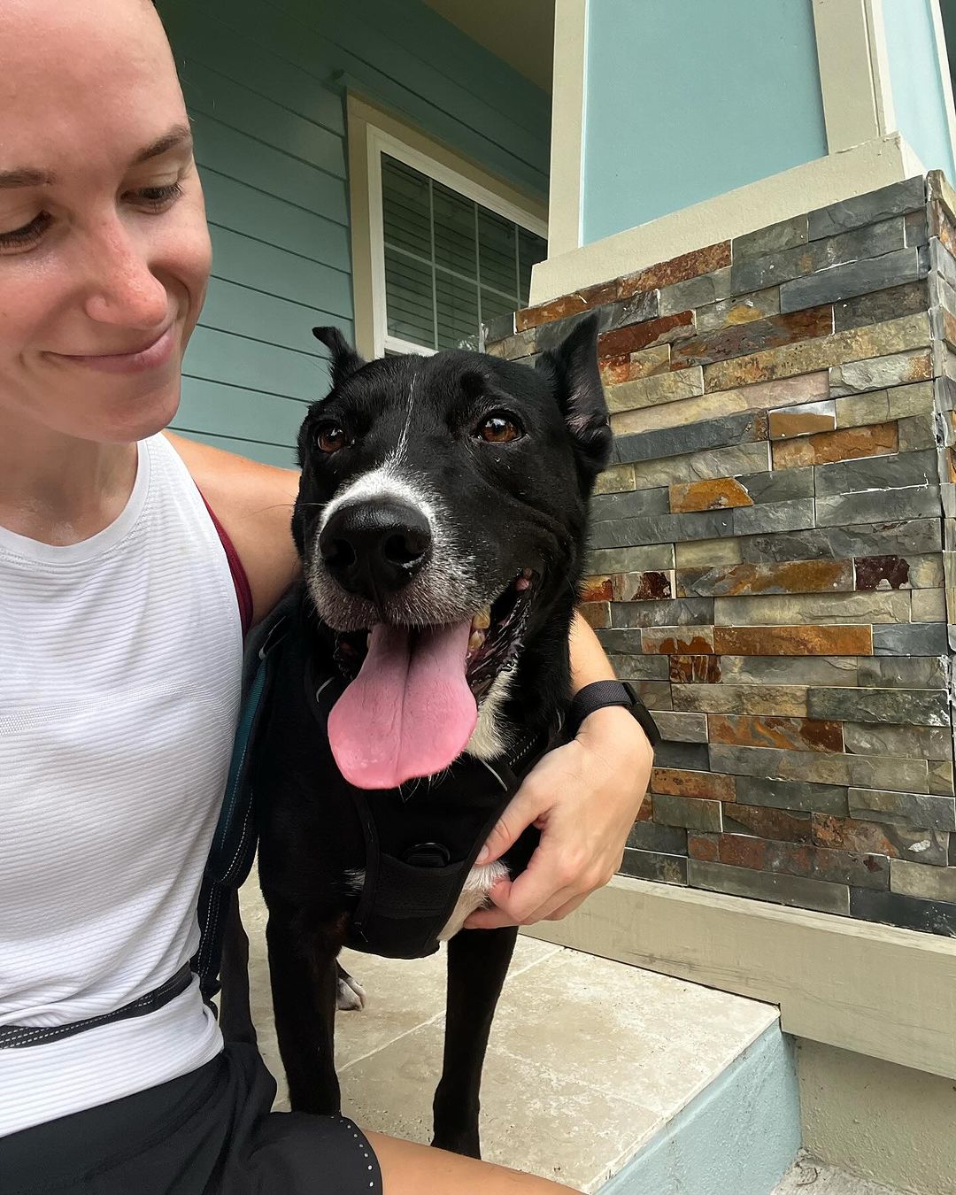 smiling woman with dog