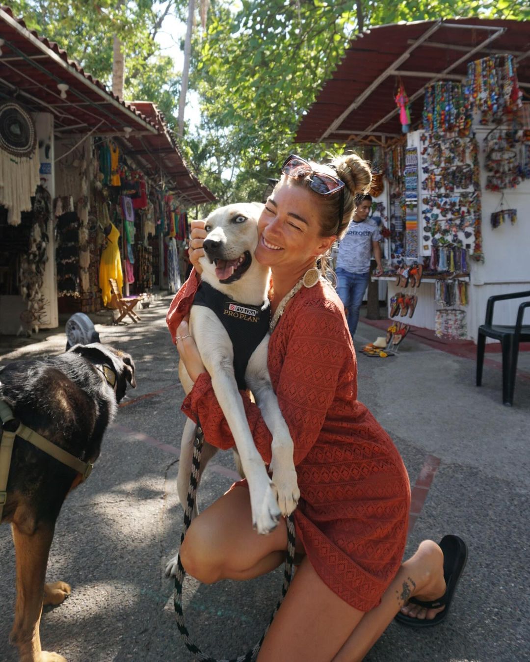 woman and dog with blue eyes