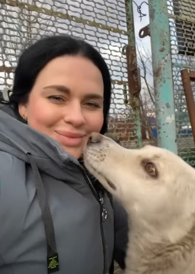 photo of woman and a dog