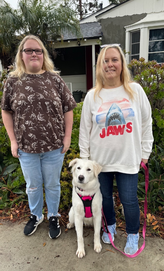 two women and a dog