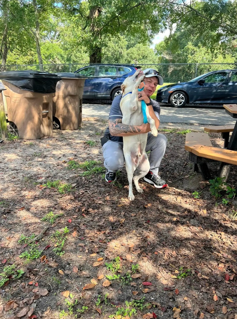 man holding the pup