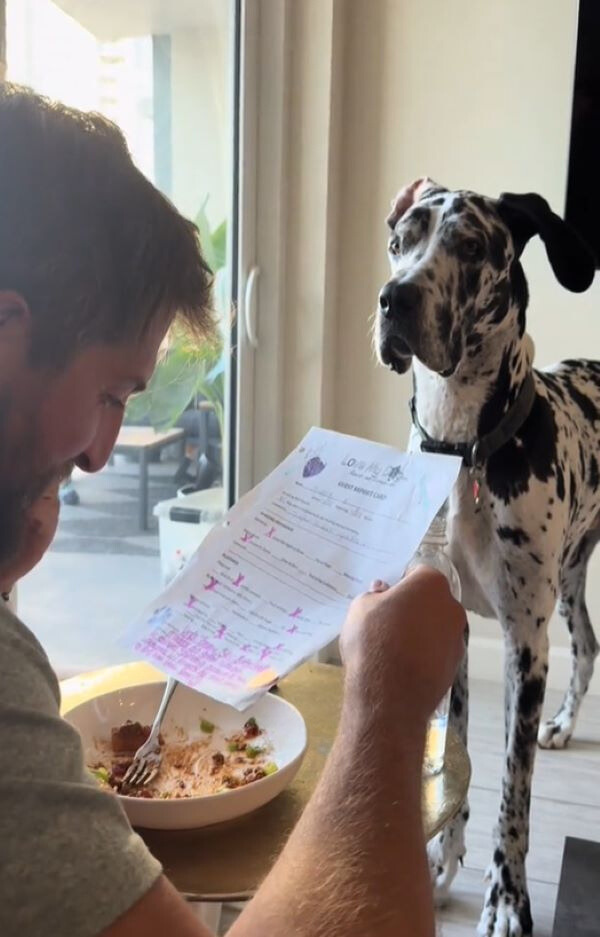 photo of man reading a note