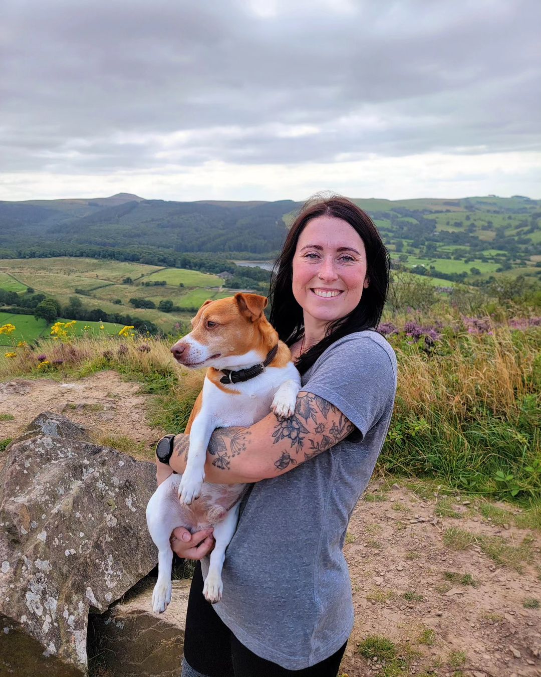 Woman holding a dog