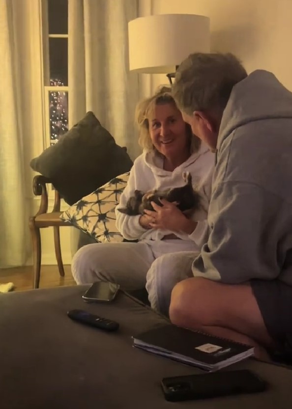 old couple and puppy