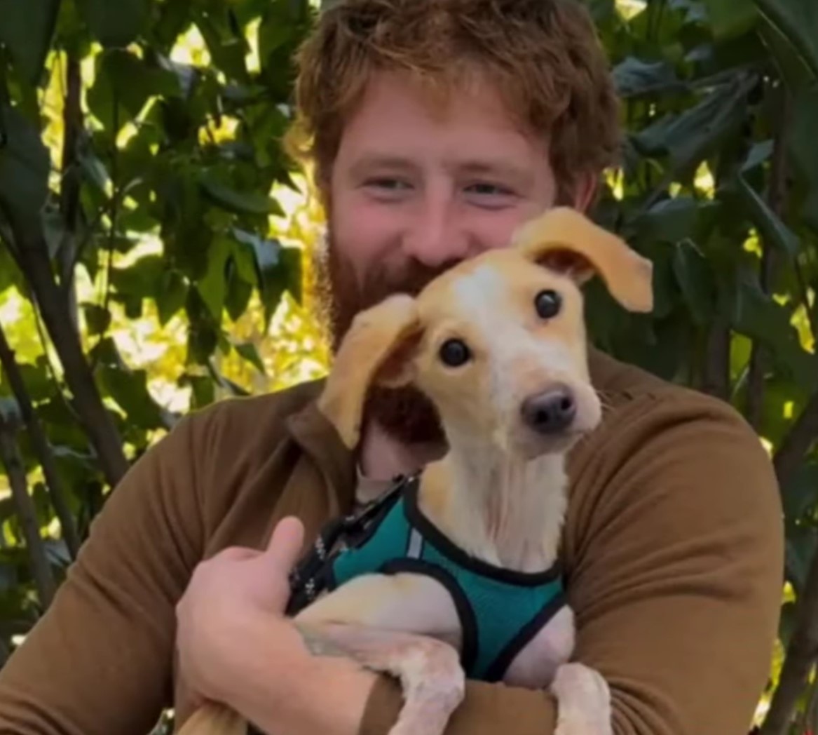 smiling man with cute dog