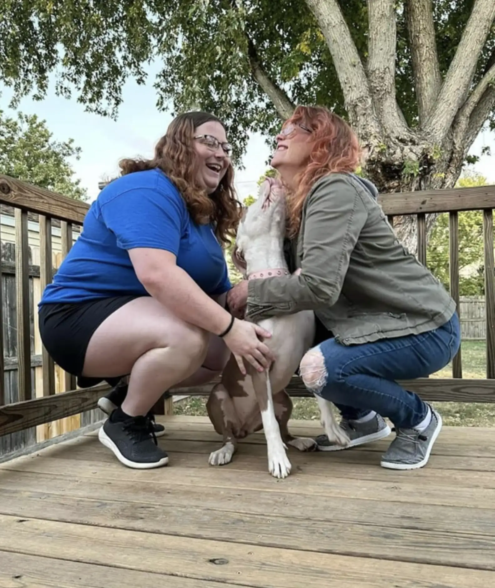 two girls and dog