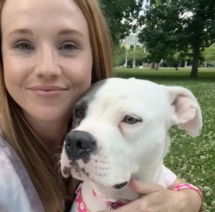 woman and white dog