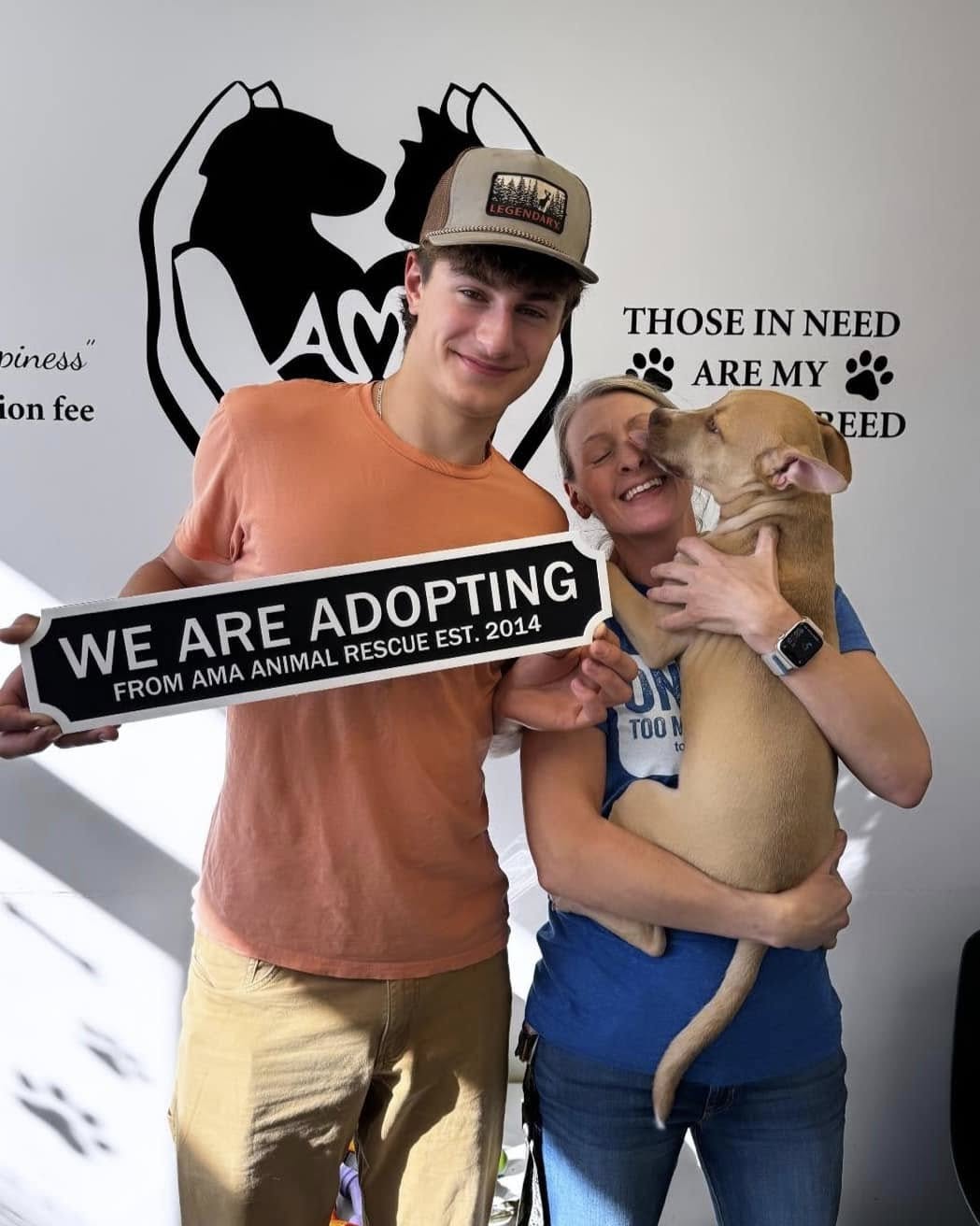 man woman and adopted pup