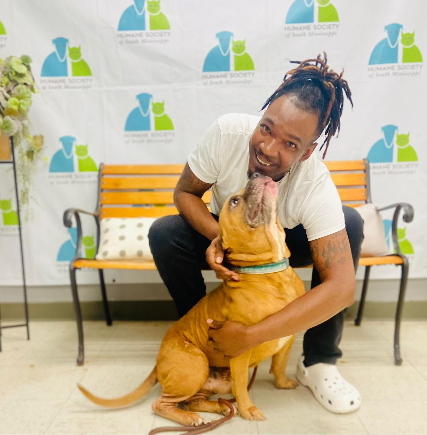 man and dog at the shelter