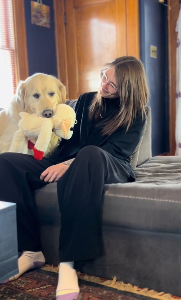 Golden retriever and woman